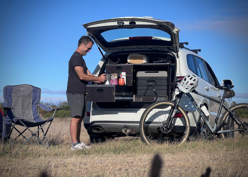 Solo cyclist exploring off-road trails with bikepacking gear